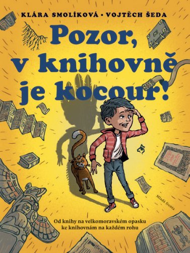 POZOR, V KNIHOVNĚ JE KOCOUR!